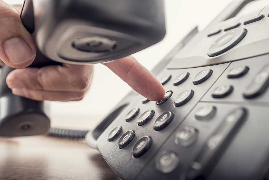 closeup of man holding phone