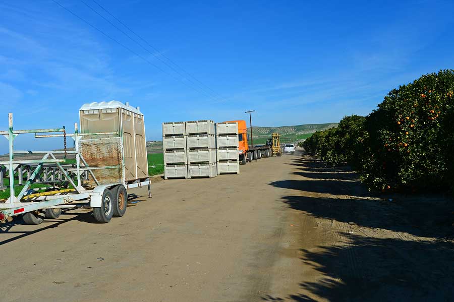Farm Site with Portable toilets for use.
